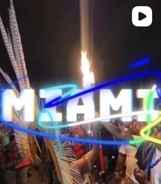 Miami nightlife with neon lights and a spark fountain